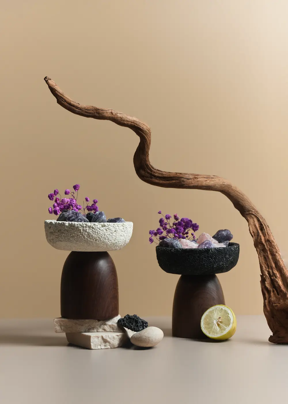 still and within vessels with mineral stones, dried flowers, and wood